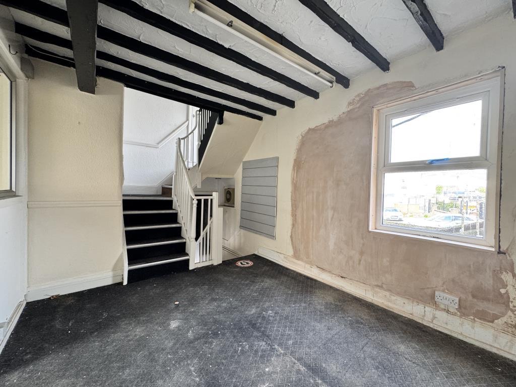 First floor and stairs leading to the second floor