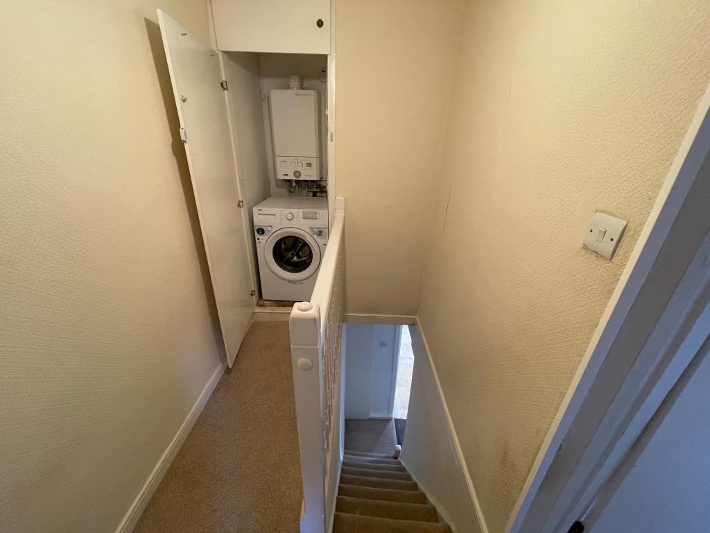 Landing with utility cupboard