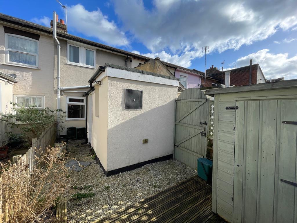 Rear elevation of the house and yard