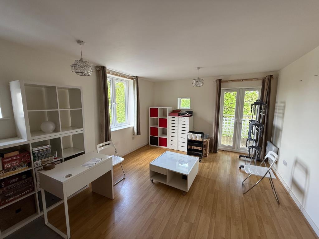 Living room with doors to balcony