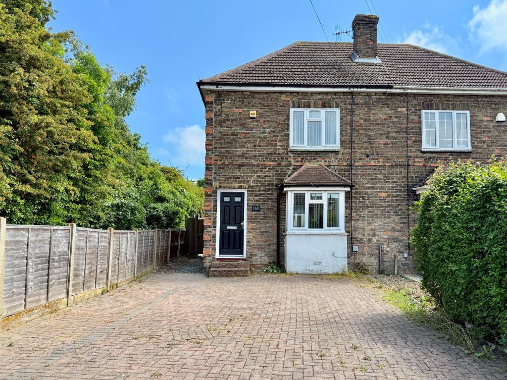 Semi-detached house with driveway