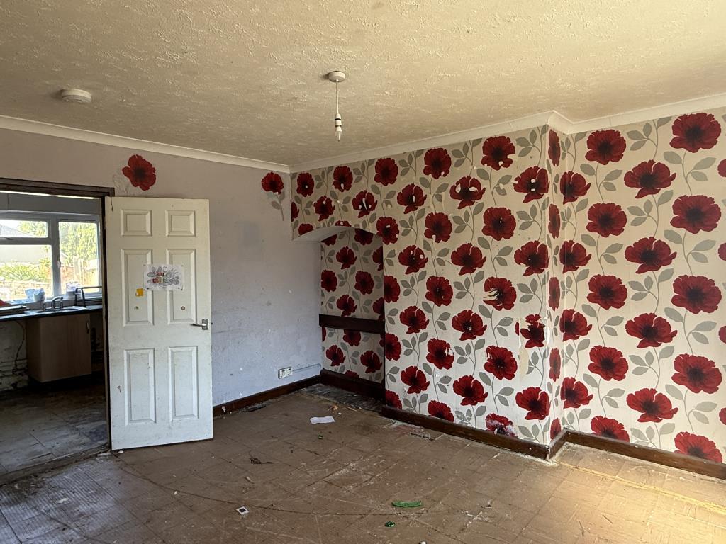 Living Room of House in need of refurbishment