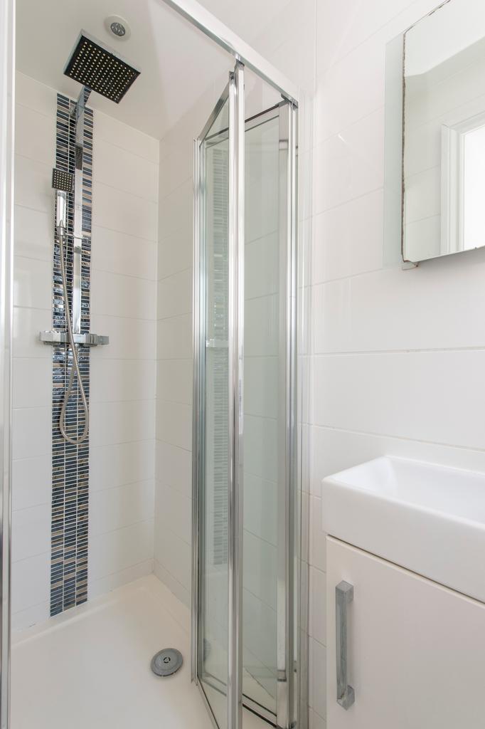 A modern and clean bathroom featuring a stylish...