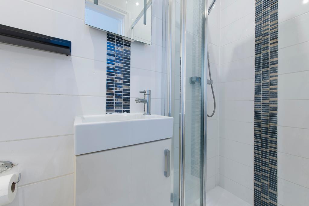 A modern and clean bathroom featuring a stylish...