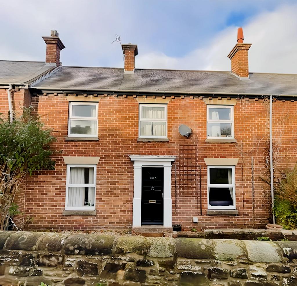 A charming exterior view of a well-maintained b...