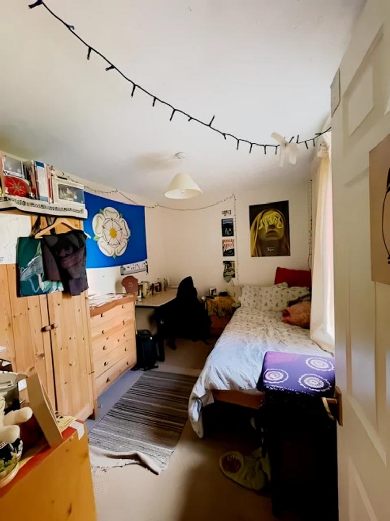 A cozy and inviting double bedroom with bright ...