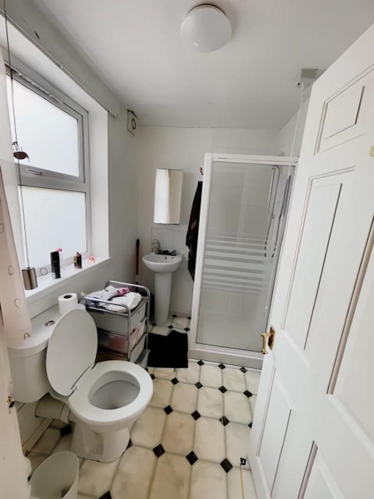 A bright and functional bathroom featuring mode...
