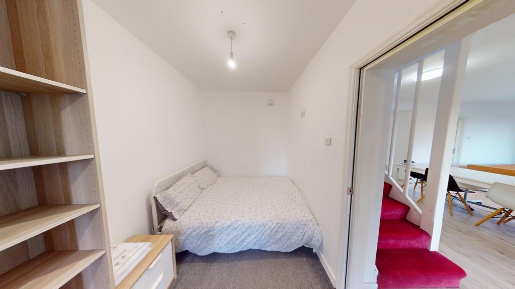 A cozy and inviting double bedroom, perfect for...