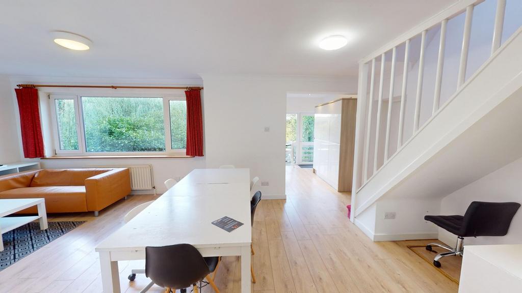 A bright and spacious modern living room, perfe...