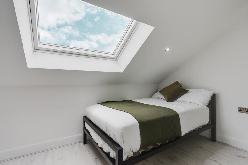 Bright and inviting double bedroom featuring a ...