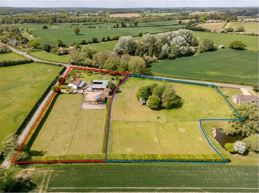 Red Outline shows land being sold  with the house
