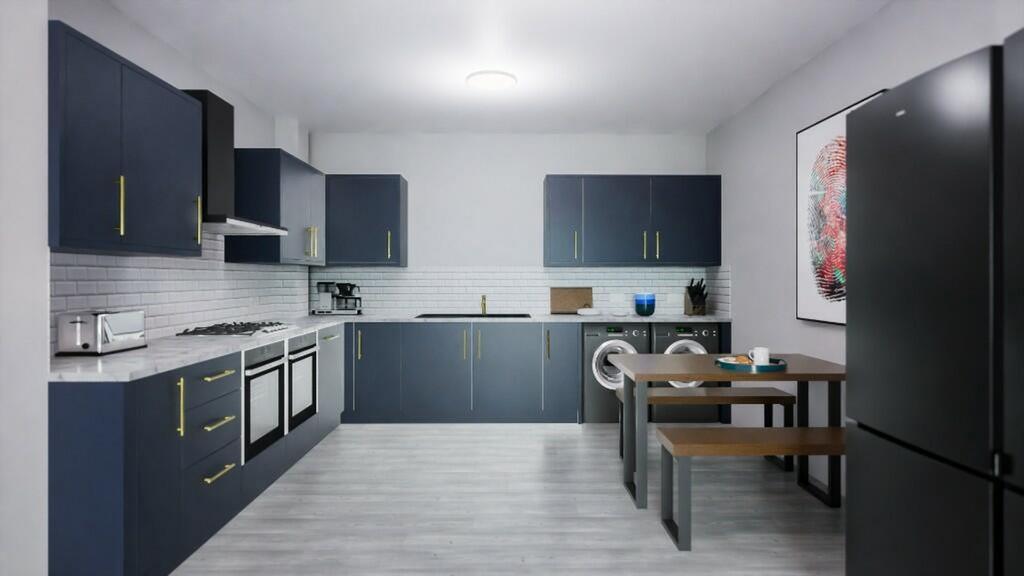 This modern kitchen features sleek cabinetry an...