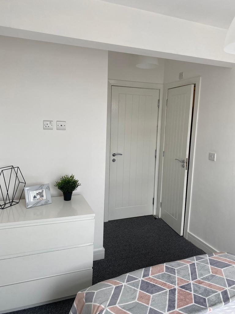 A beautifully presented double bedroom featurin...