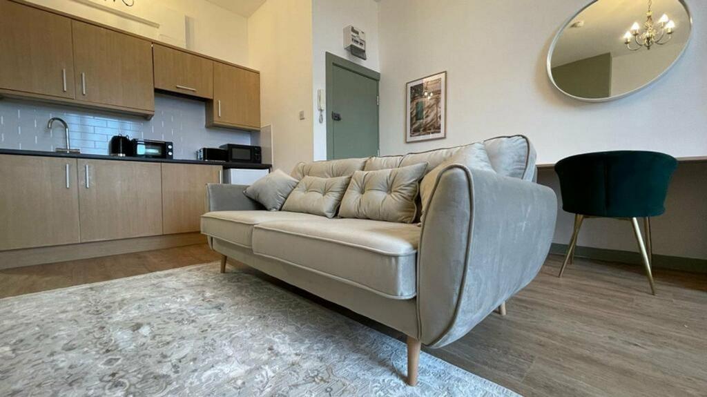A stylish and inviting living room featuring mo...