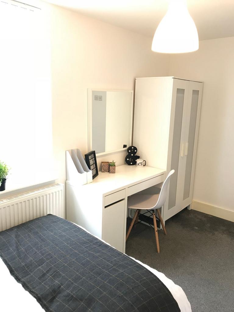 Experience comfort and style in this inviting d...