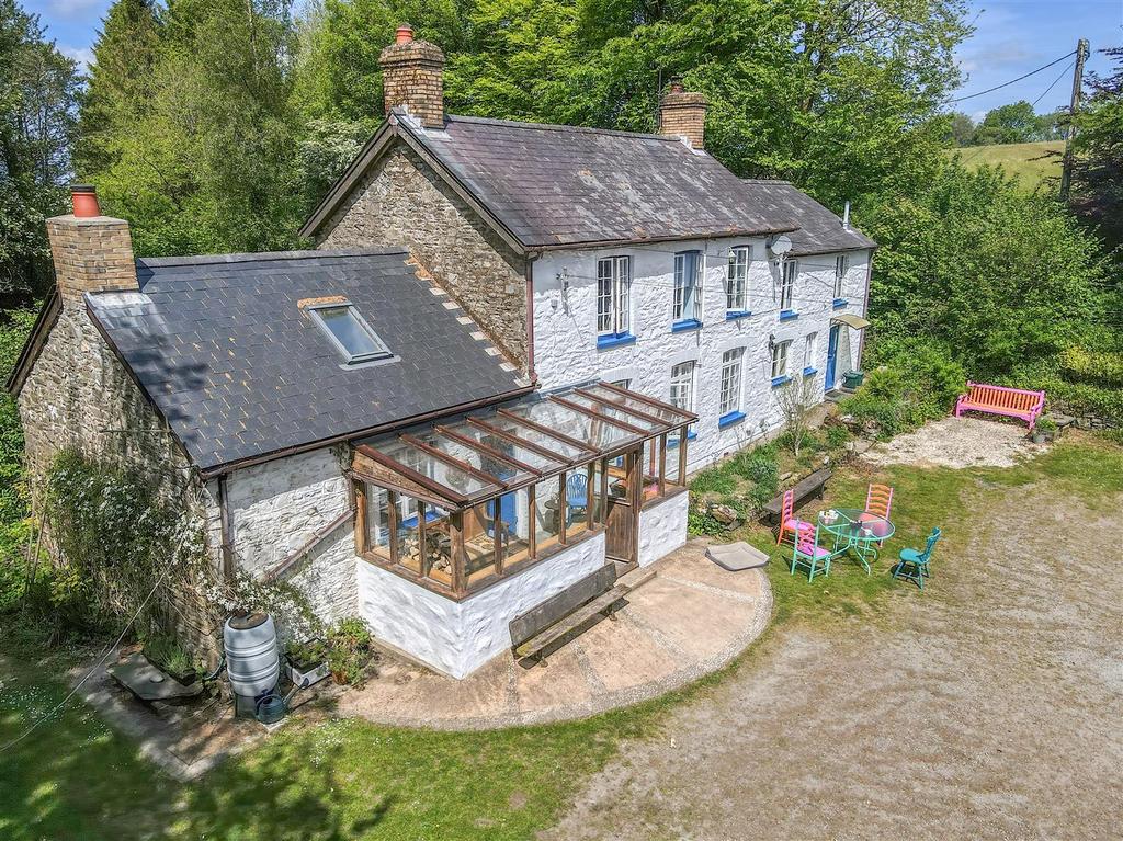 Another view of main house and cottage