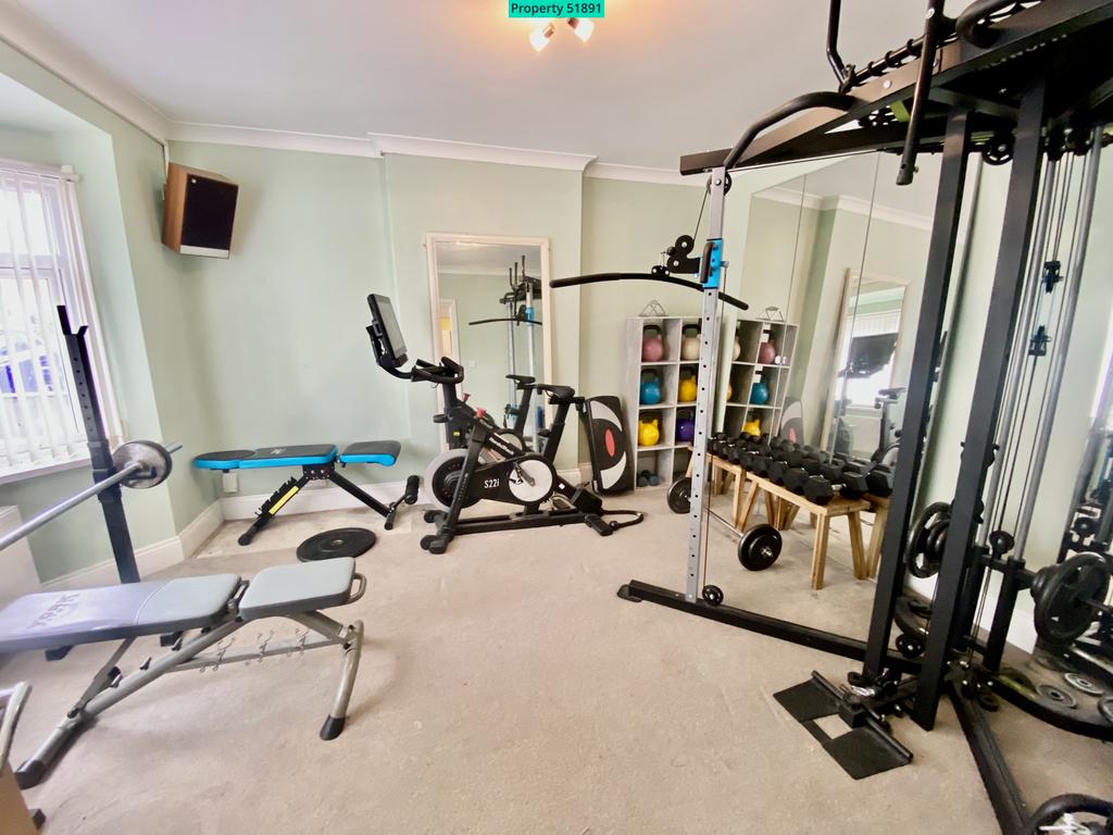 Front bedroom / used as gym