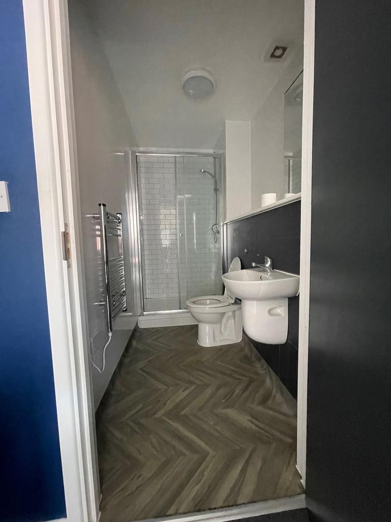 A modern and well-maintained bathroom featuring...