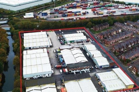 Warehouse to rent, Longford Trading Estate Manchester M32 0JT
