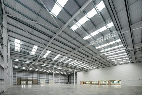 Distribution warehouse to rent, Trafford Park Rd Manchester M17 1HJ