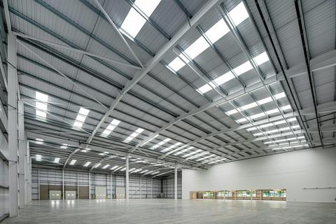 Distribution warehouse to rent, Trafford Park Rd Manchester M17 1HJ