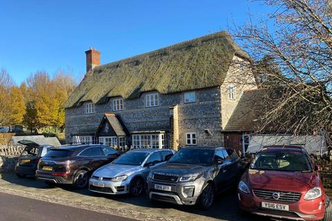 Retail property (high street) for sale, 20 The Sq Dorchester DT2 9WG