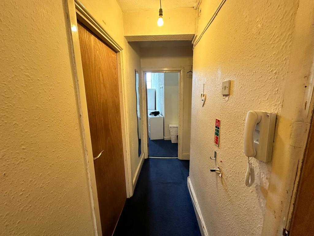 A tidy hallway with a welcoming atmosphere, ide...