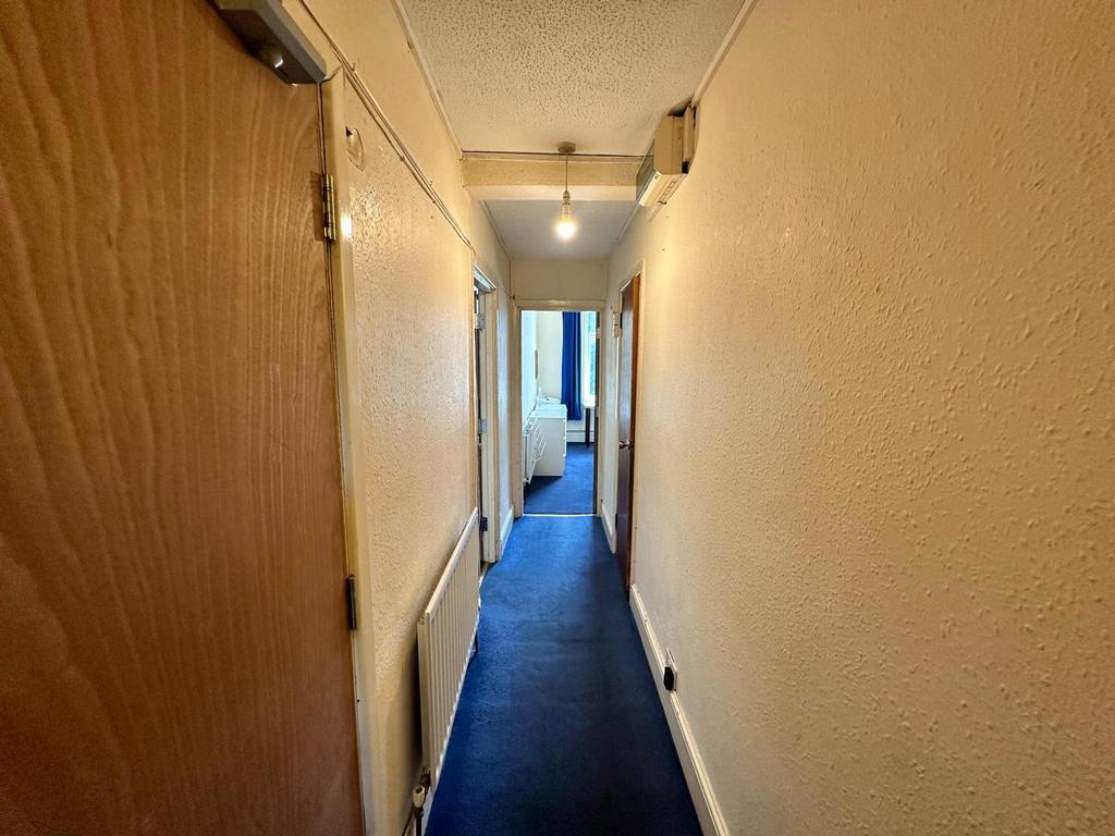 A well-maintained hallway providing access to v...