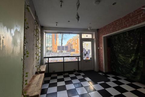 Retail property (high street) to rent, 10-11 Church St Brighton BN1 1US