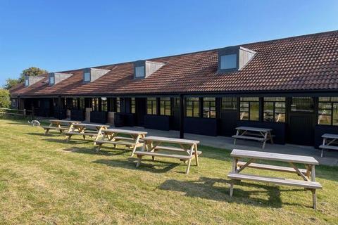 Retail property (high street) to rent, The Old Racecourse Lewes BN7 1UR