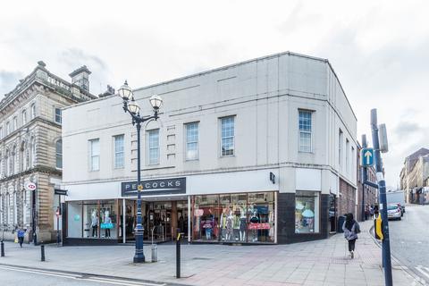 Retail property (high street) to rent, 2-12 Market Pl Dewsbury WF13 1DJ