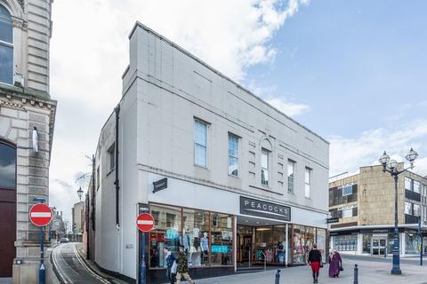 Retail property (high street) to rent, 2-12 Market Pl Dewsbury WF13 1DJ