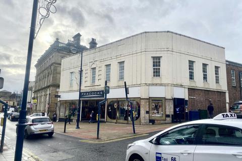 Retail property (high street) to rent, 2-12 Market Pl Dewsbury WF13 1DJ