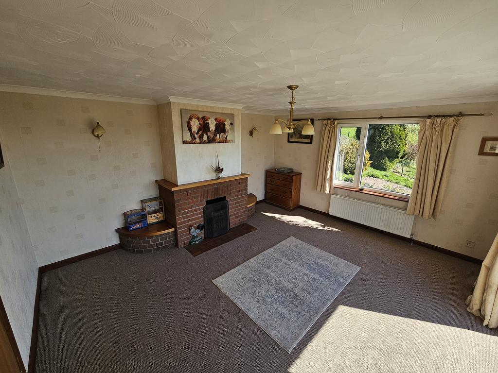 Sitting room with open fireplace