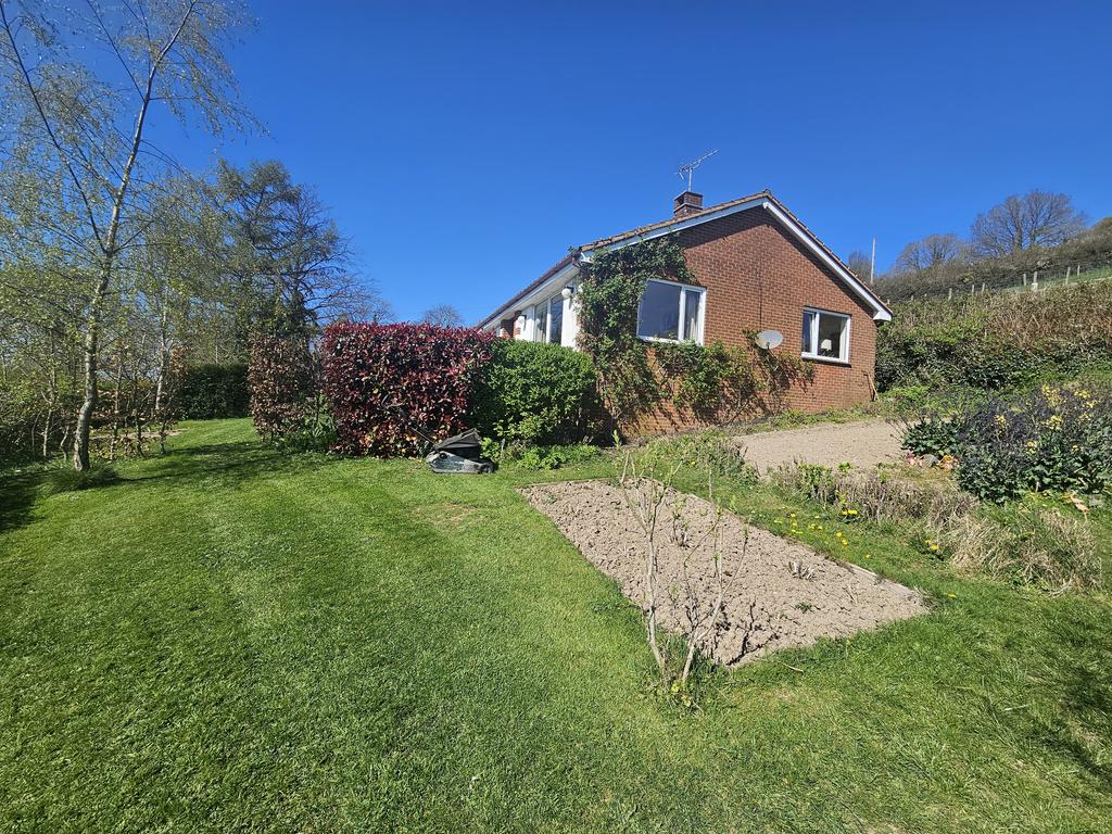 Bungalow and vegetable garden