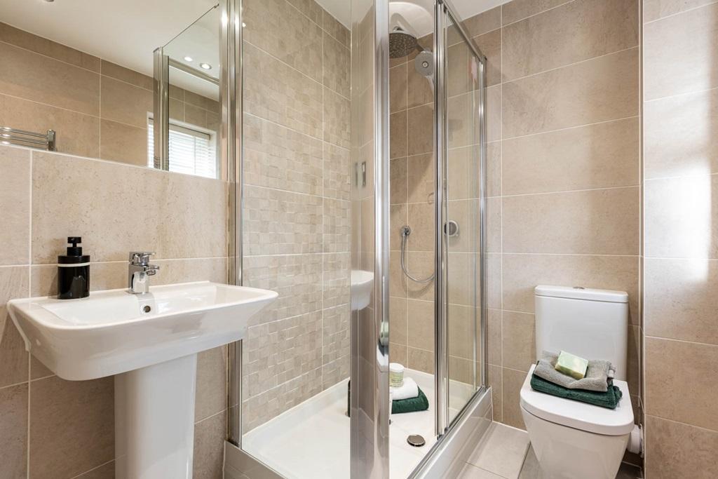 En suite shower room away from the family