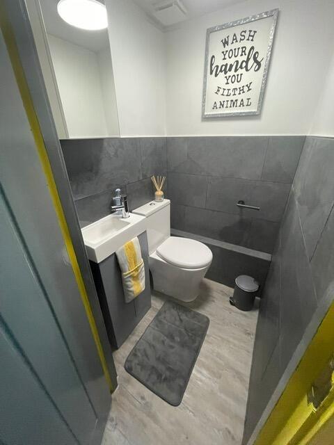 A modern and neatly maintained single toilet ro...
