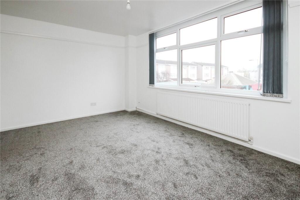 Bright and freshly painted double bedroom featu...