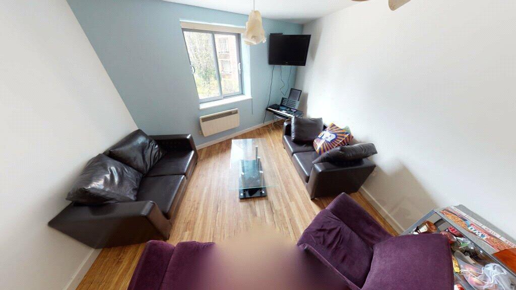 A cozy living room featuring comfortable seatin...