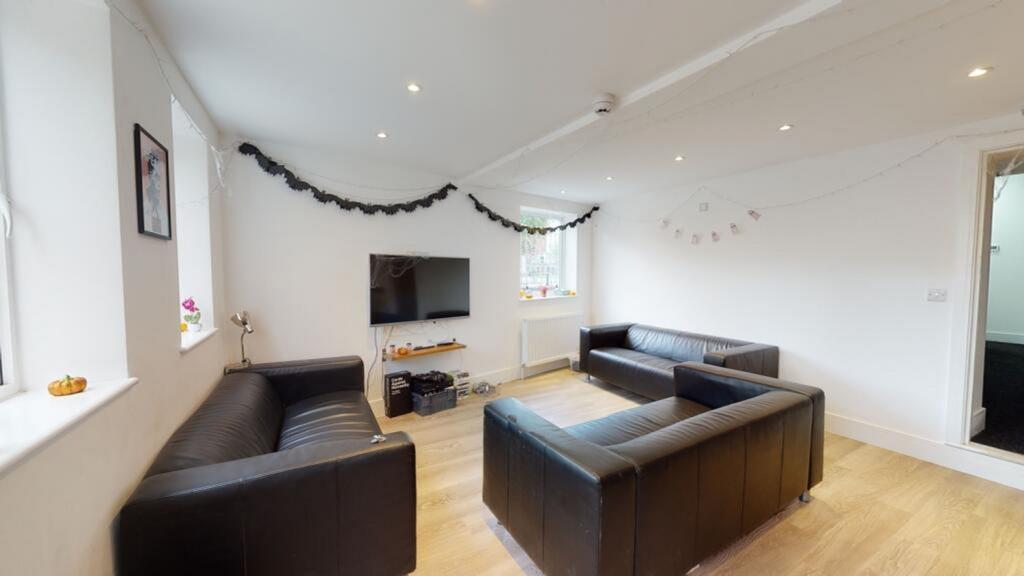 Spacious and inviting living room perfect for r...