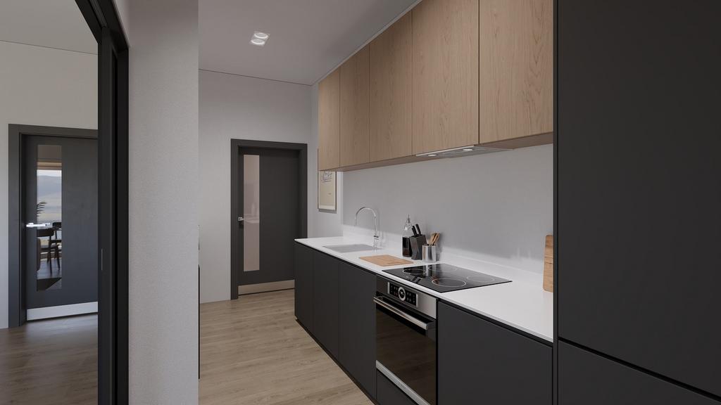 A modern and tidy kitchenette featuring sleek c...
