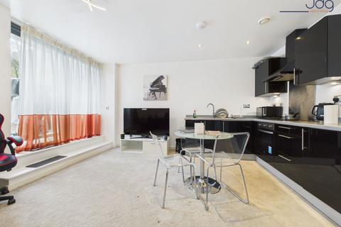 undefined, Mill View House, Aalborg Place |  A 1 bed apartment with canal views and private parking