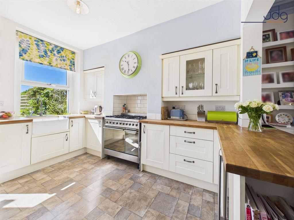 Shaker style kitchen with solid wooden...