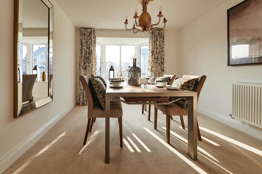 Double doors lead from the dining area to the...