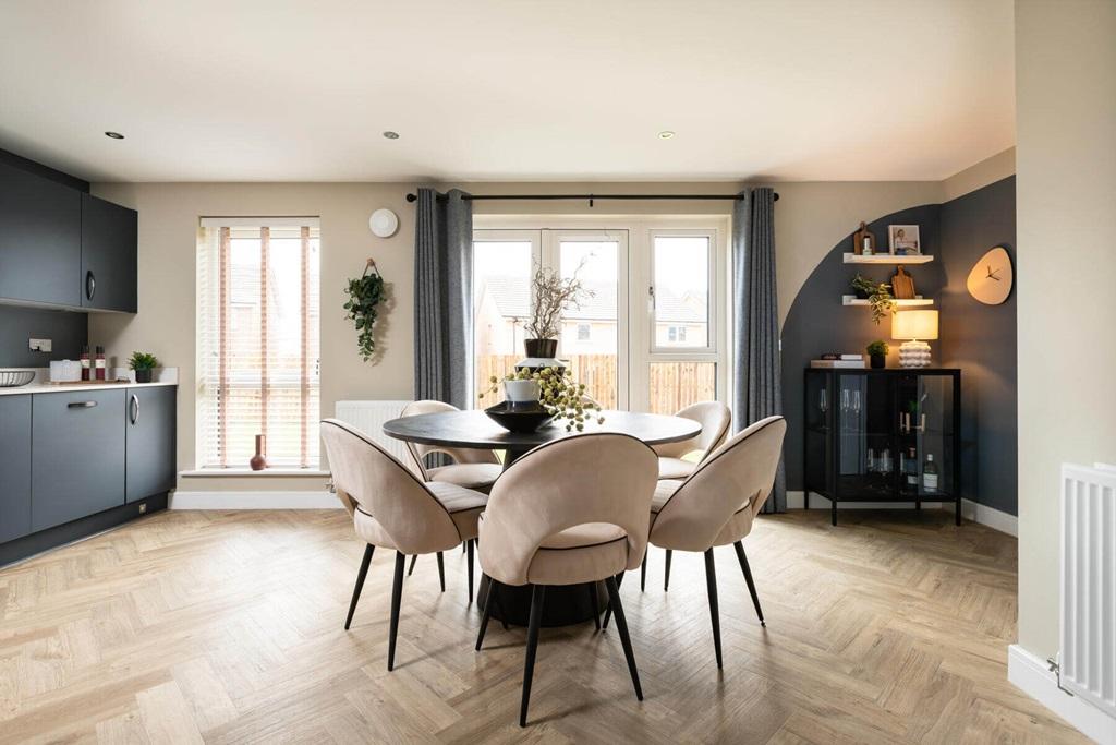 Double doors lead from the dining area to the...