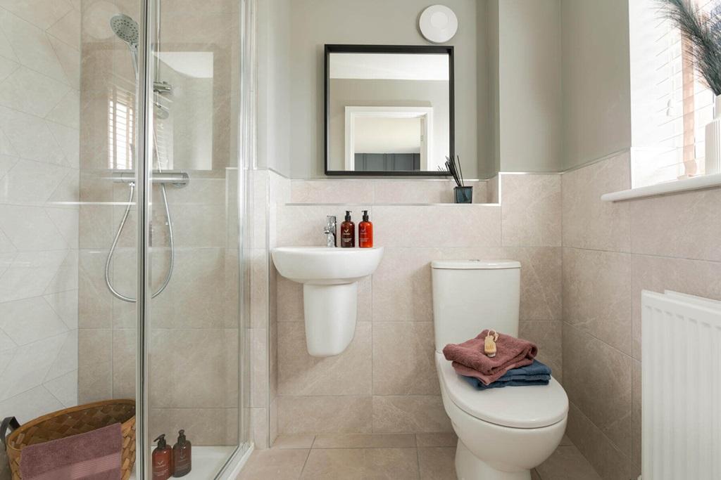 Bedroom 1 also features a private en suite...