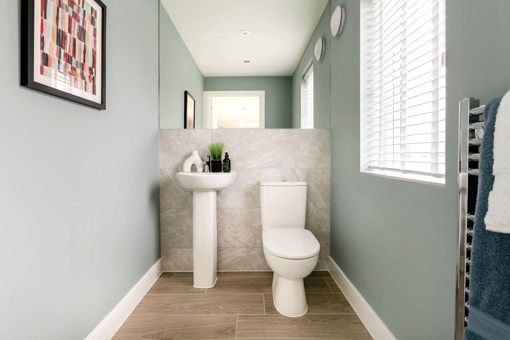 A guest cloakroom completes the ground floor