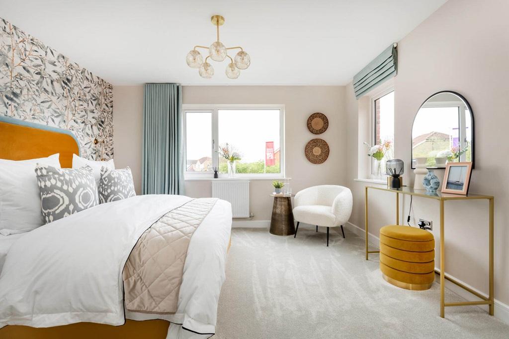 A spacious main bedroom offers plenty of room...