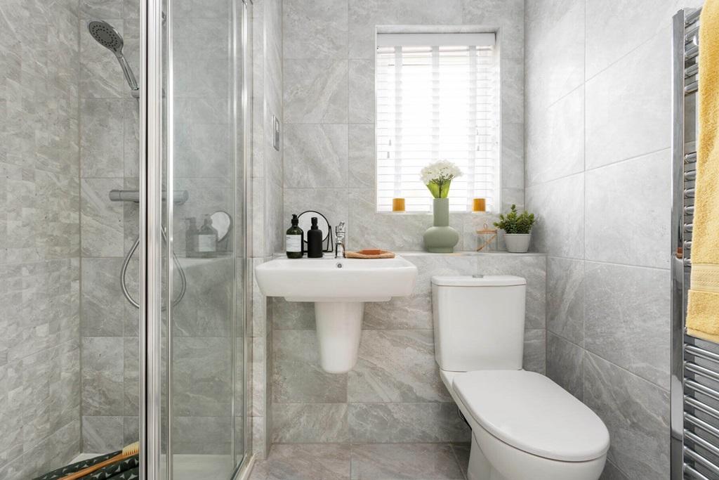 Bedroom 1 hosts a private en suite show room