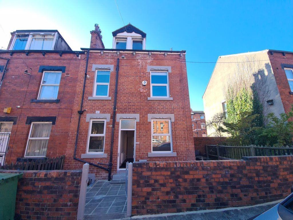 A charming brick-fronted property with a welcom...